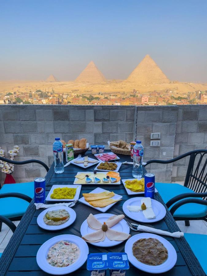 Jumeirah Pyramids View Inn Kafret el-Gabal Buitenkant foto
