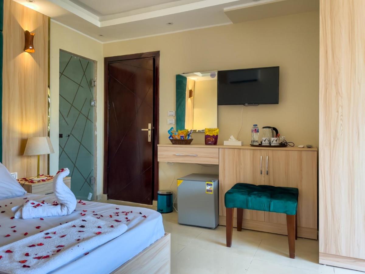 Jumeirah Pyramids View Inn Kafret el-Gabal Buitenkant foto