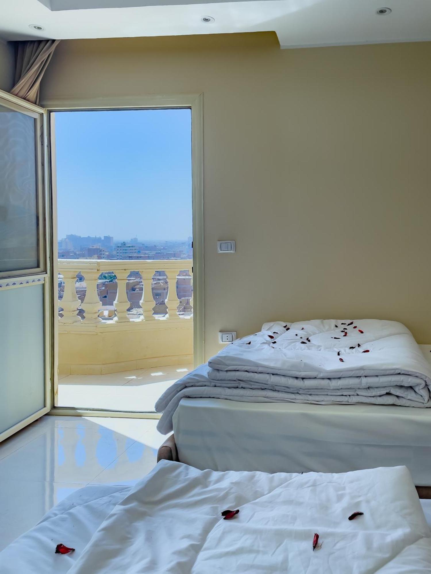 Jumeirah Pyramids View Inn Kafret el-Gabal Buitenkant foto